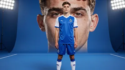 A photorealistic image of an anonymous 21-year-old Club Brugge striker in a blue jersey with white sleeves and blue...